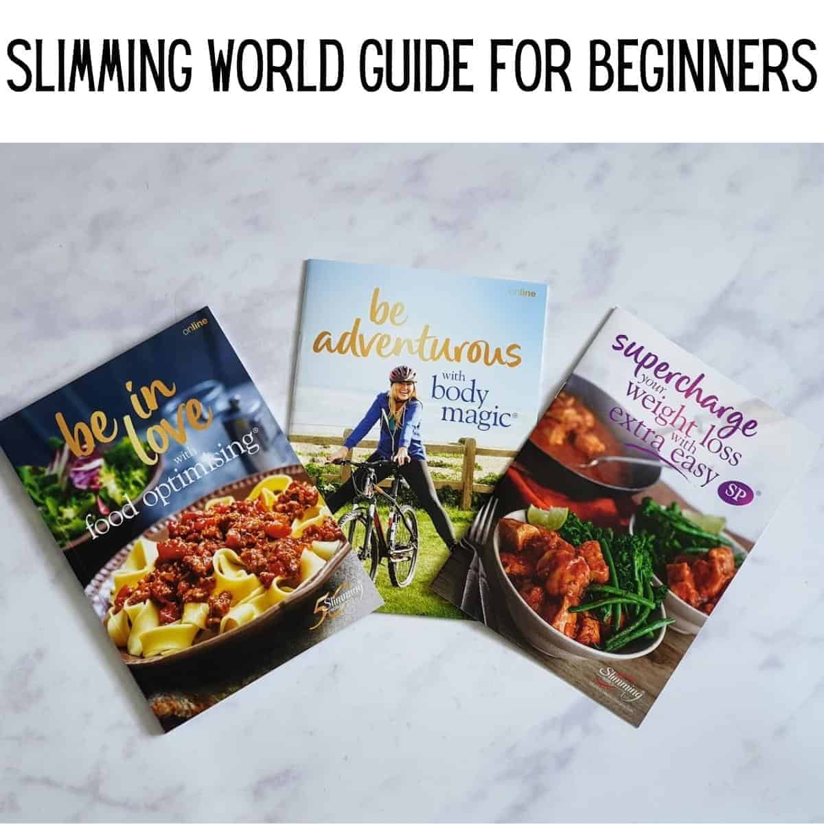 Three Slimming World beginner guides rest on a marble surface, offering valuable information with titles on food optimization, body magic, and weight loss tips.