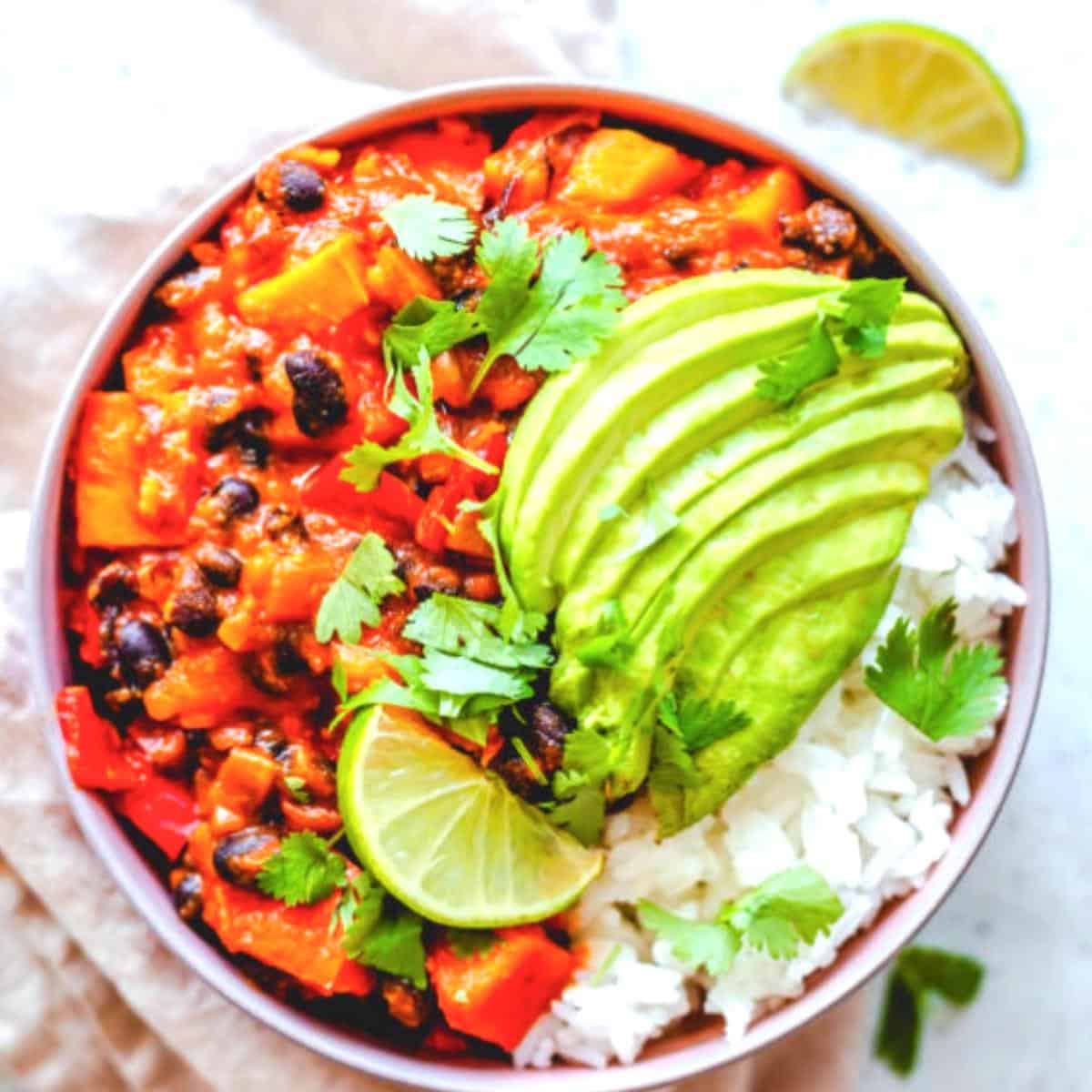 black bean bowl in a dish with rice and avocado