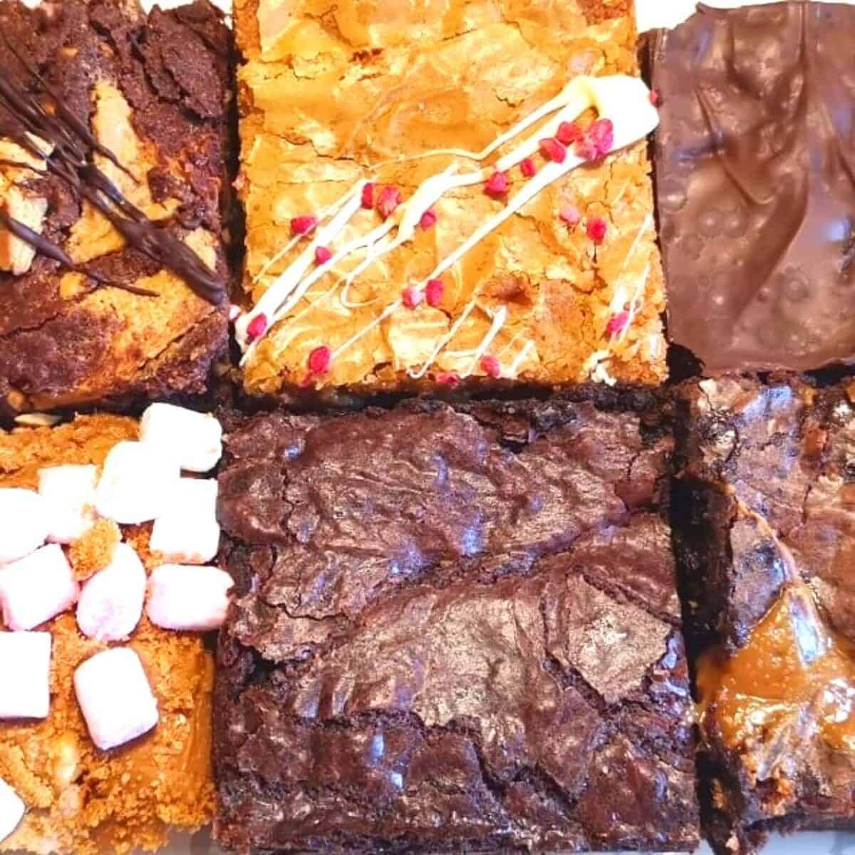 a group of brownies on a white surface