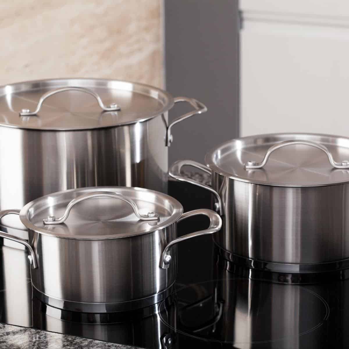 shiny pans on an induction hob