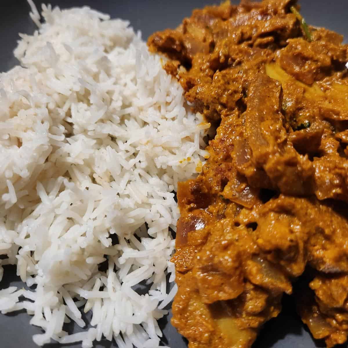 chicken tikka served with rice