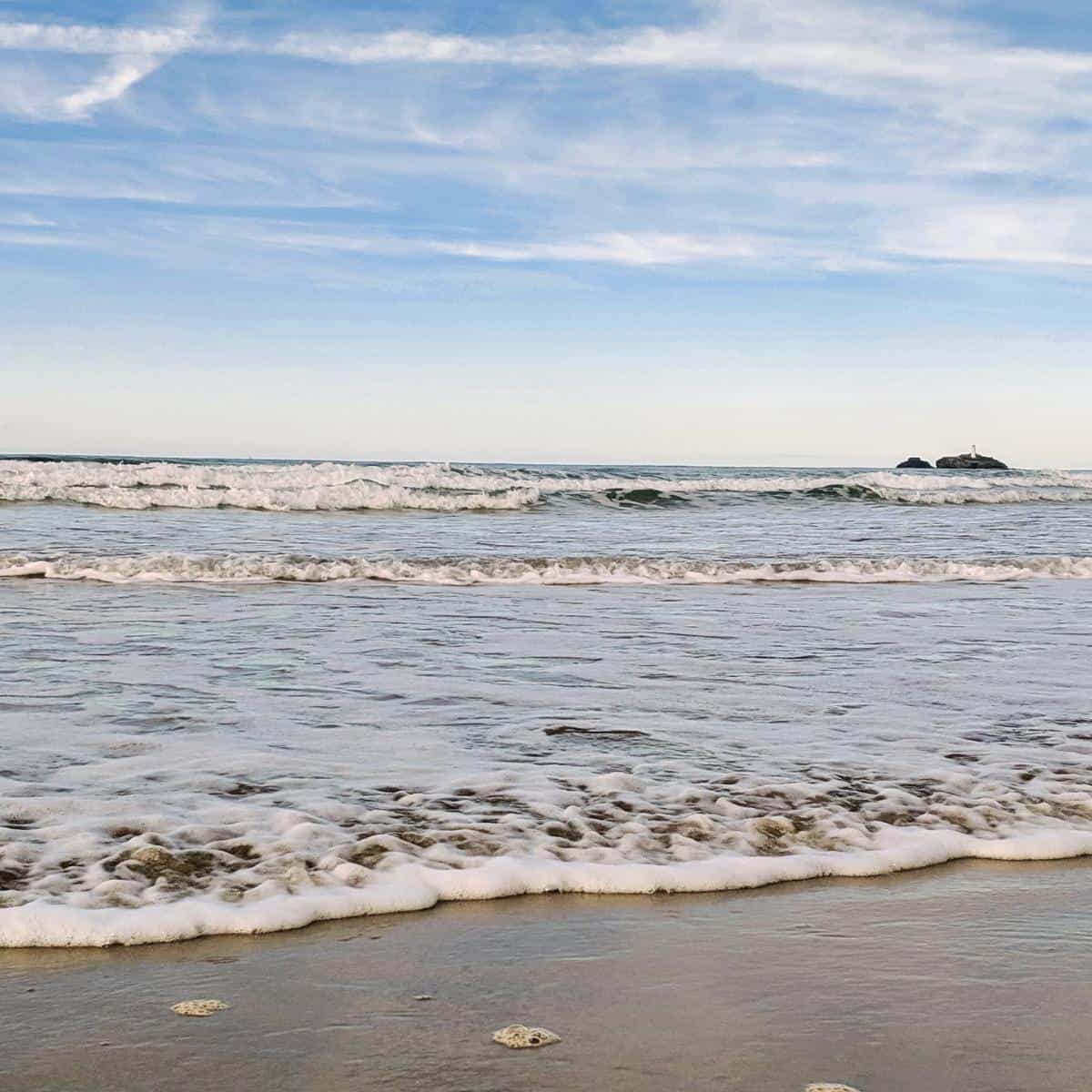 beach with tide coming in