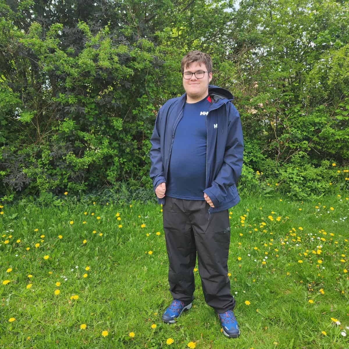 young man dressed in hiking clothes
