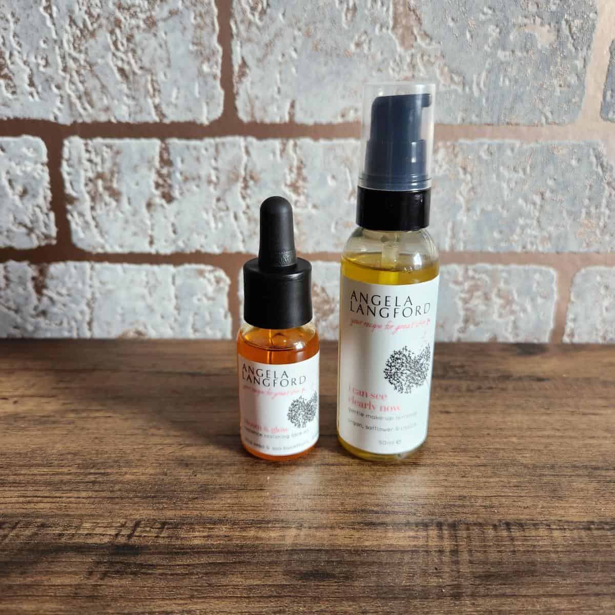 angela langford skincare products on a wooden table