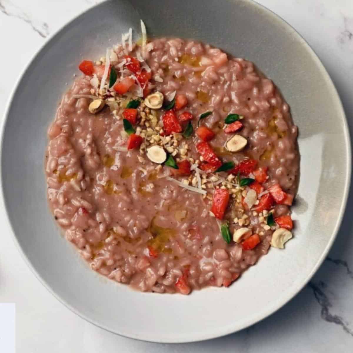 Bowl of freshly cooked strawberry rice.