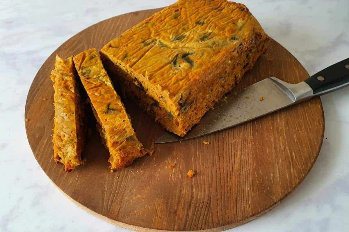 Curry loaf sliced on a wooden board