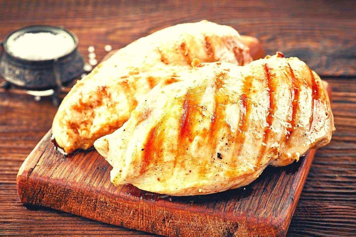 Two grilled chicken breasts.
