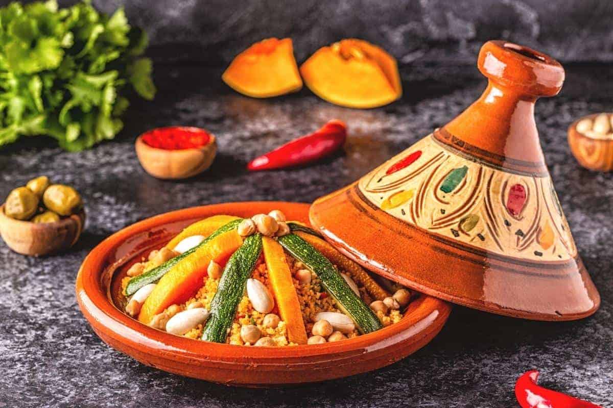 Tagine pot filled with vegetable tagine.