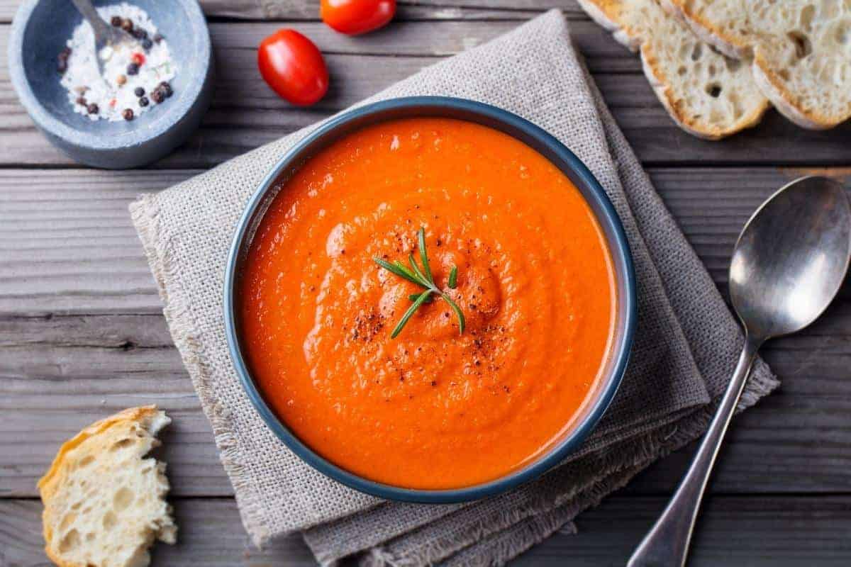 Tomato soup in a dark bowl