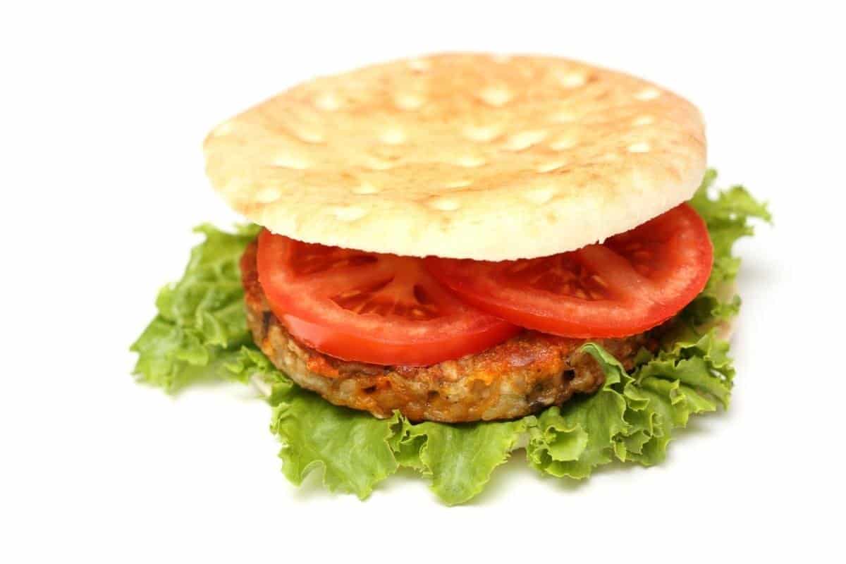 butter bean veggie burgers in a white roll.