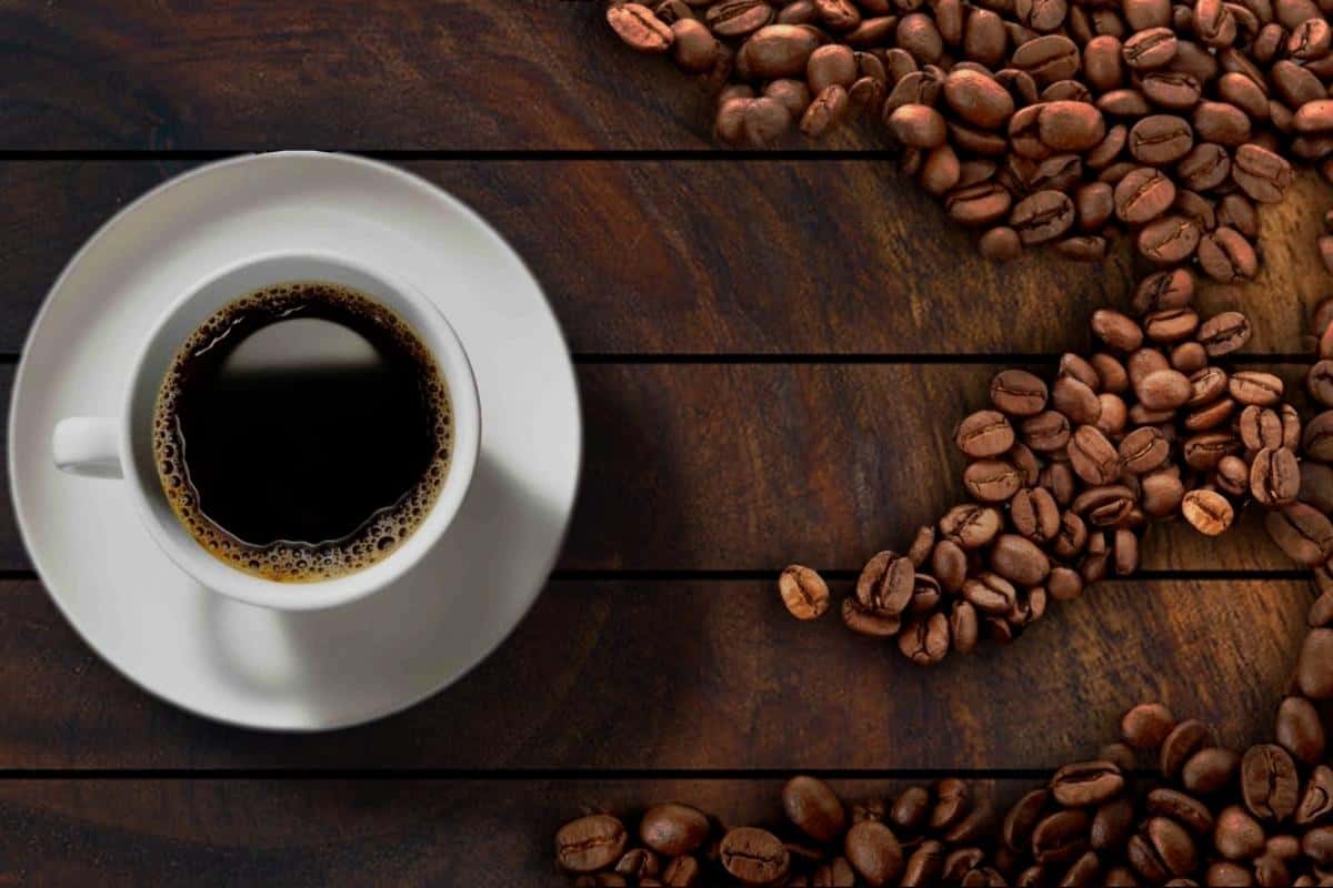 white cup of black coffee