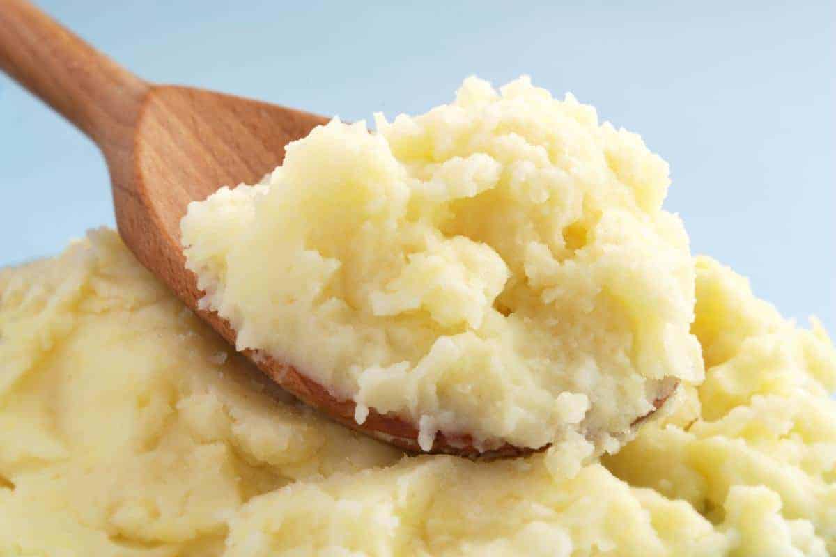 mashed potatoes on a wooden spoon