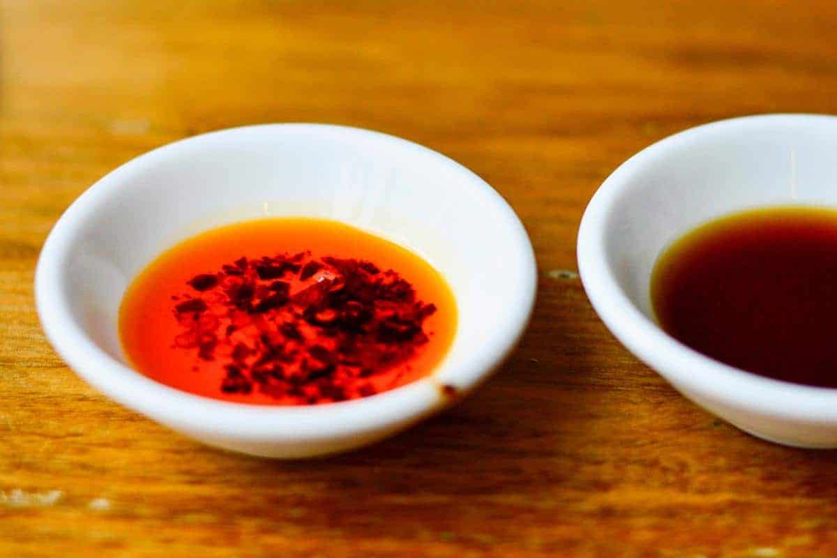 chilli oil in a white dipping bowl