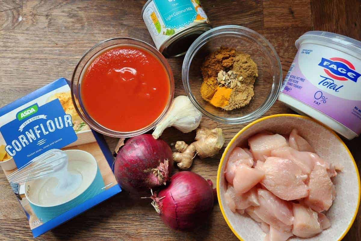 Ingredients needed for slow cooker chicken tikka masala.