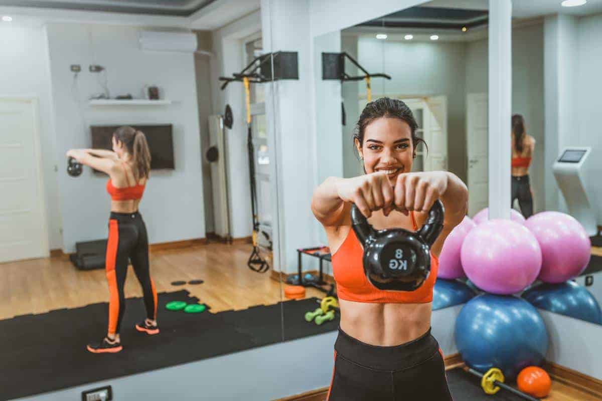 lady holding a kettlebell