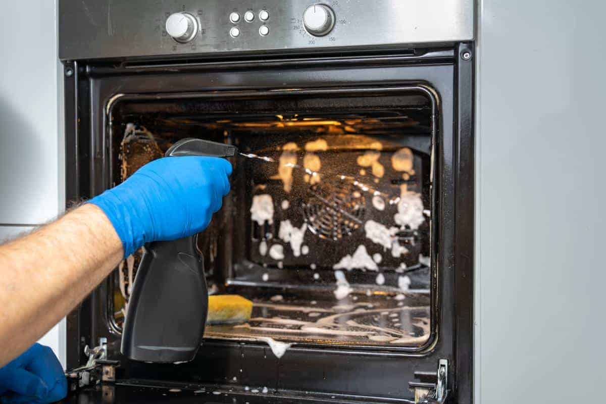 An oven being cleaned.
