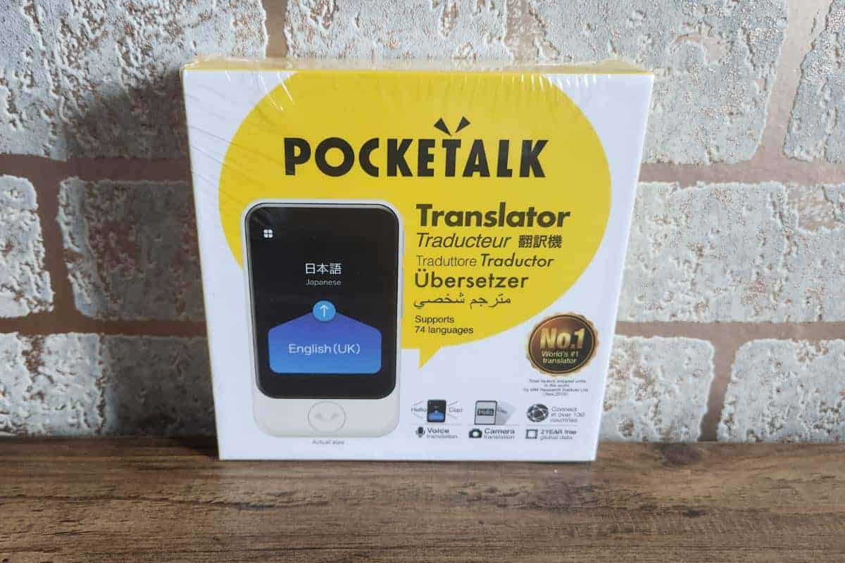 Pocketalk translater in a box it looks like a mobile phone.