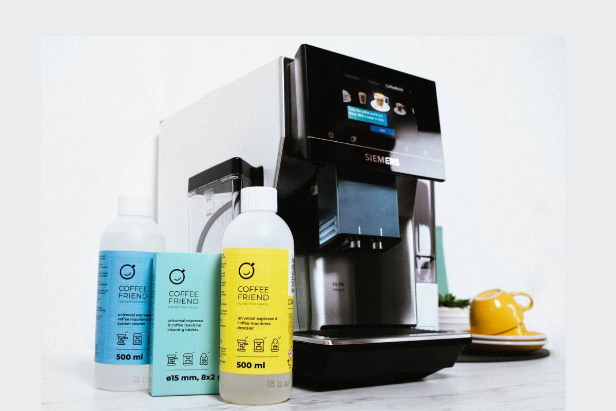Coffee machine with coffee friend products next to it