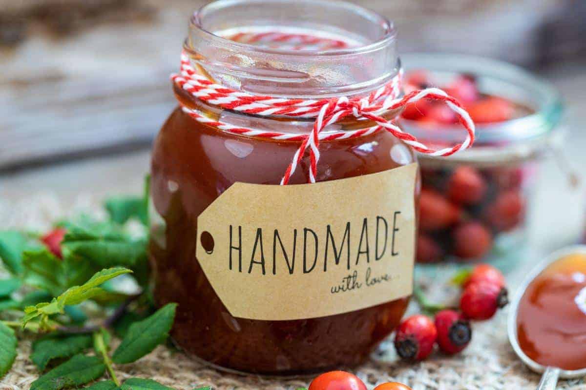 Homemade Jam in a jar with a label saying handmade with love.