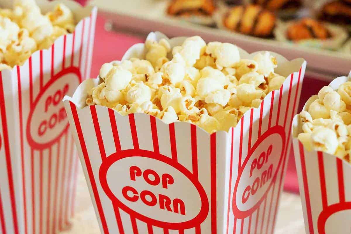 cinema popcorn in the cardboard box as bought at the cinema.