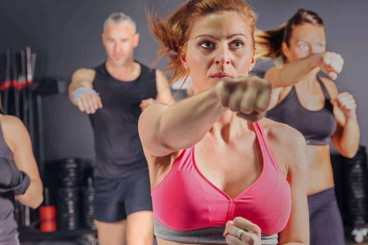 Group of people doing body combat for a fun exercise.