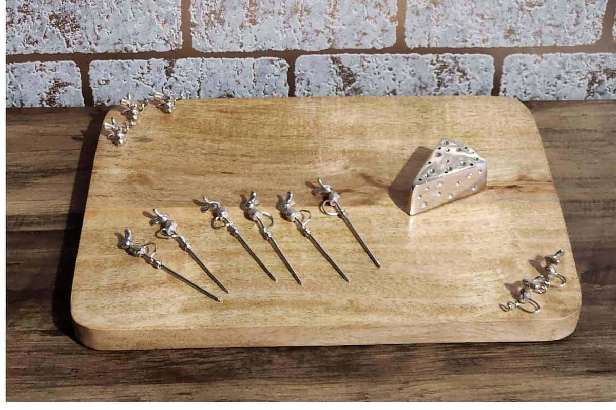 mice style cheese board with cheese picks.