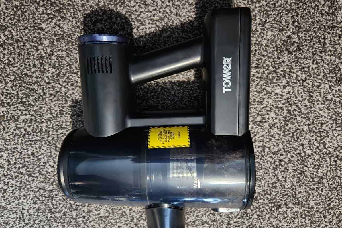 a vacuum cleaner on carpet