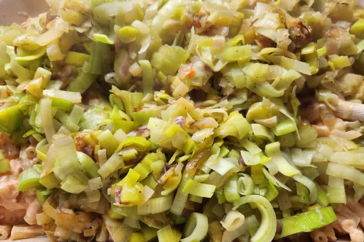 Cooked leeks and red onions.