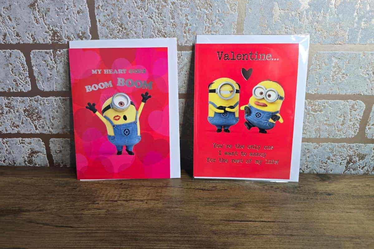 Two Valentine's Day cards featuring Minion characters capture the essence of love. One card declares, "My heart goes boom boom," while the other humorously states, "Valentine... You're the only one I want to annoy for the rest of my life." Perfect additions to any gift guide celebrating affection.