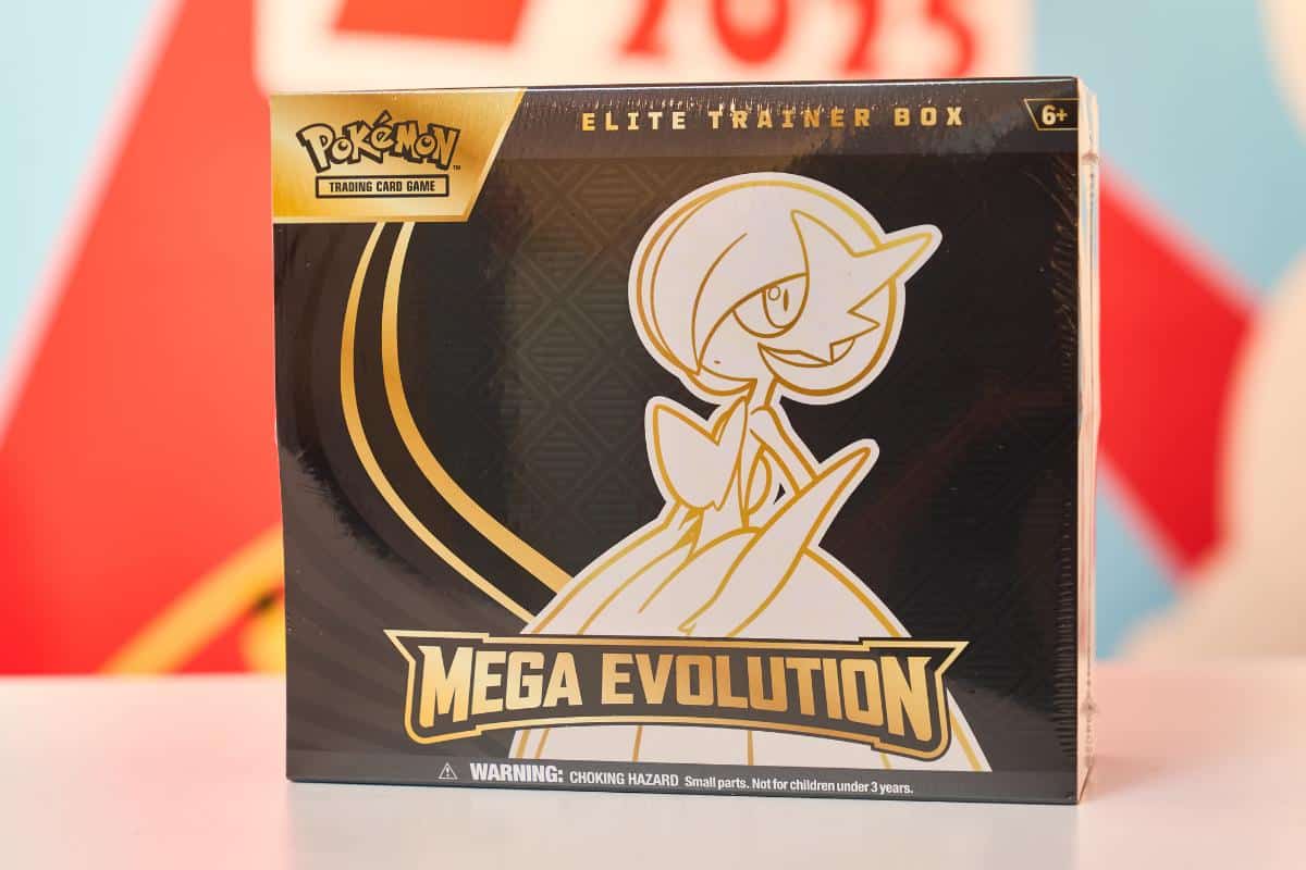 A Top Toys 2025 pick, this Pokémon Trading Card Game Elite Trainer Box showcases Mega Evolution with a gold-outlined Mega Gardevoir on a black box—perfect for kids' Christmas lists. Includes a choking hazard warning; for ages 6 and up.