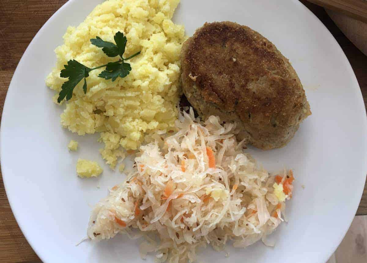 Pork cutlets with mashed potatoes and salad.