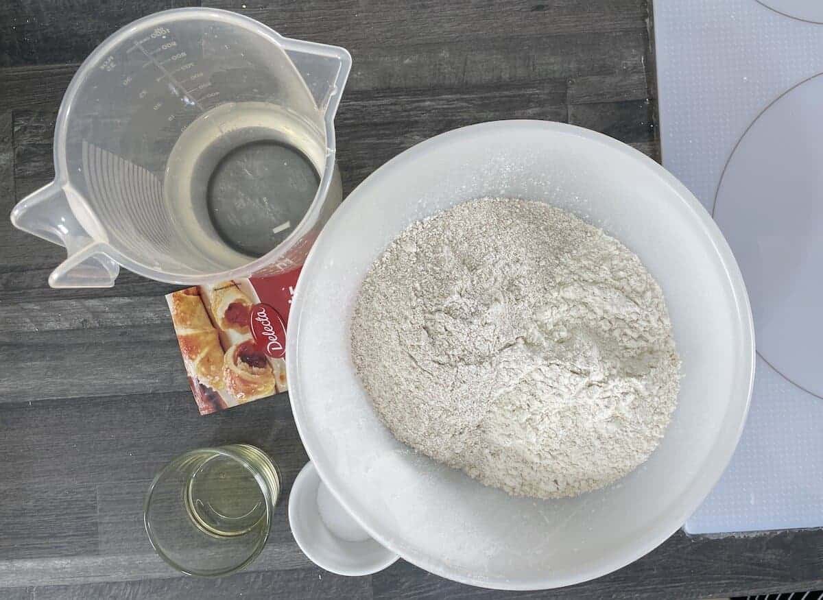 Knead all the ingredients for Polish whole wheat bread.