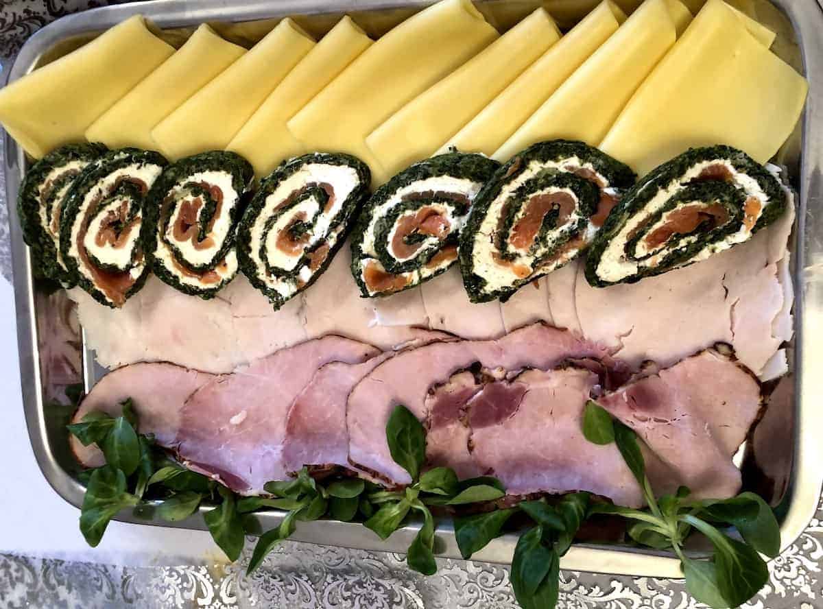 Easter snack platter with salmon spinach rolls.