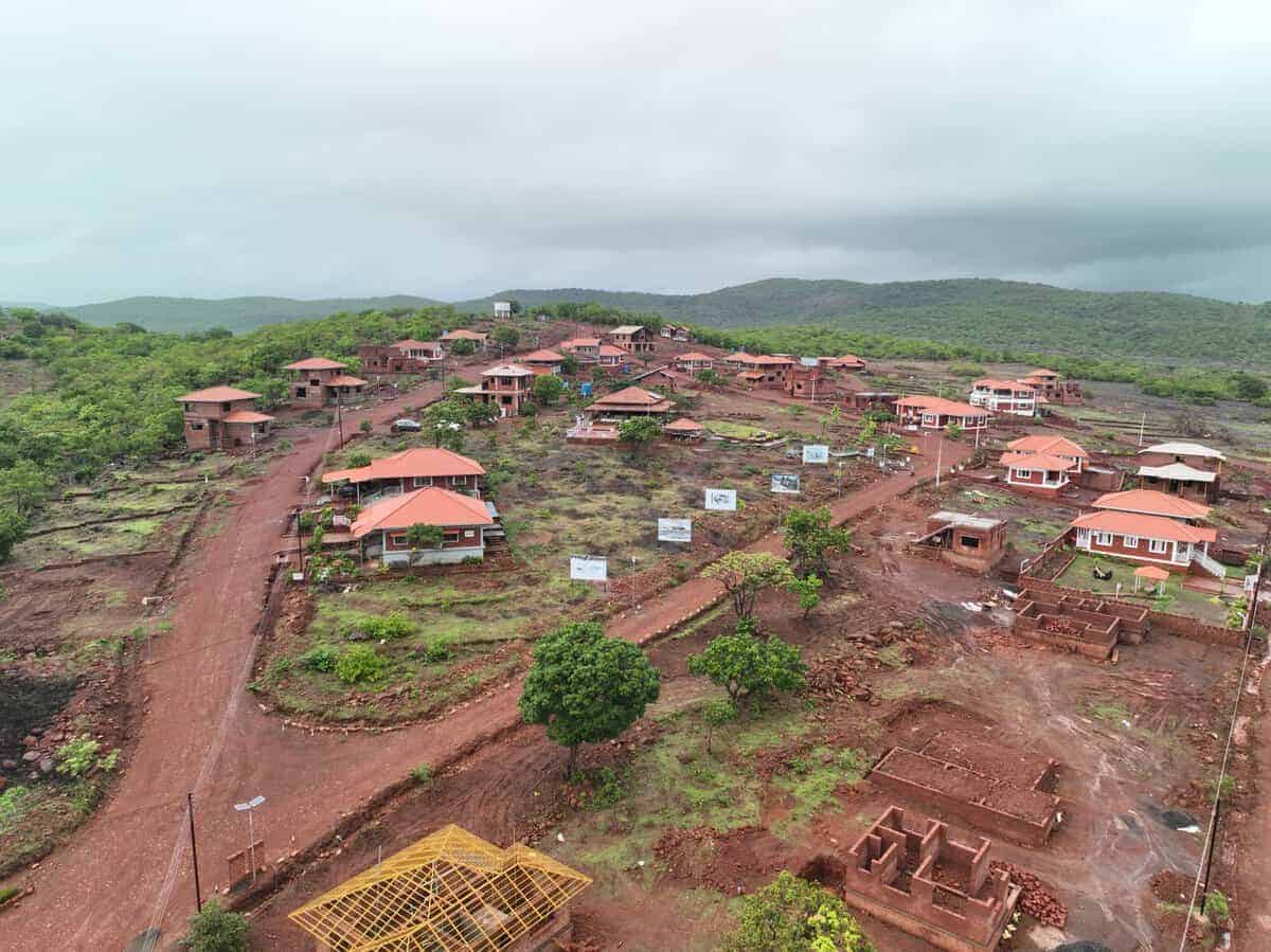 Villas for sale in Dapoli – Konkan Trails aerial view of built Chira brick bungalows, Dabhol Road