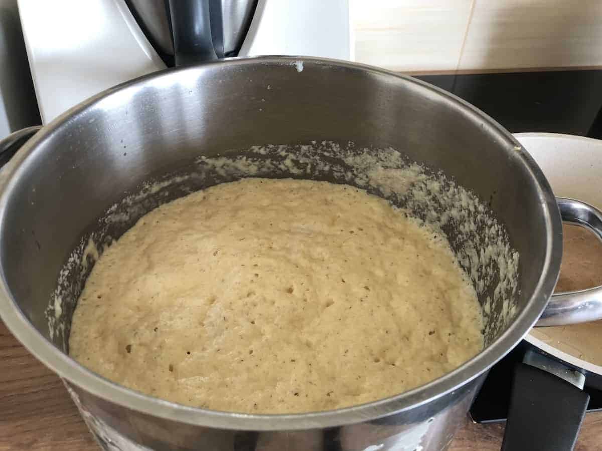 Raacuchy dough in a steel pot.