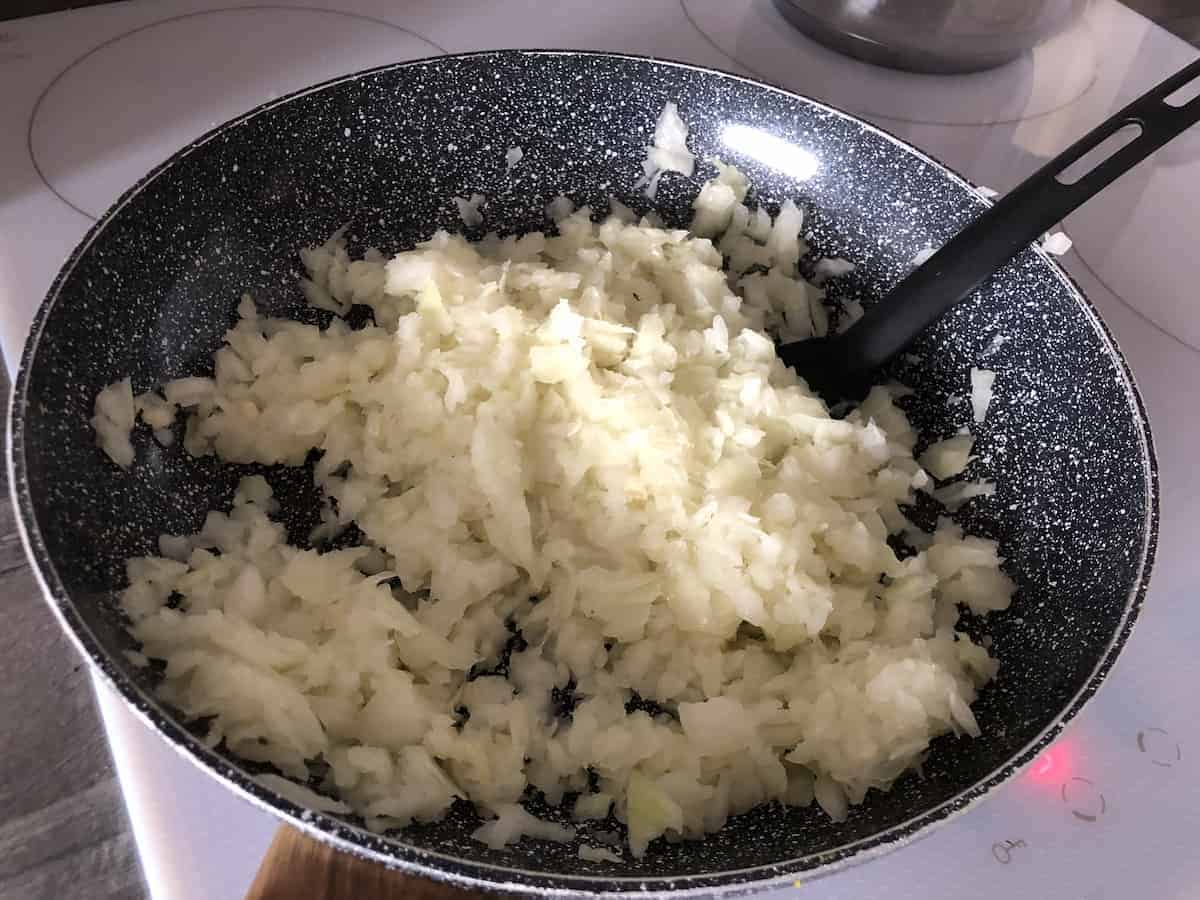 Minced onions in a frying pan.