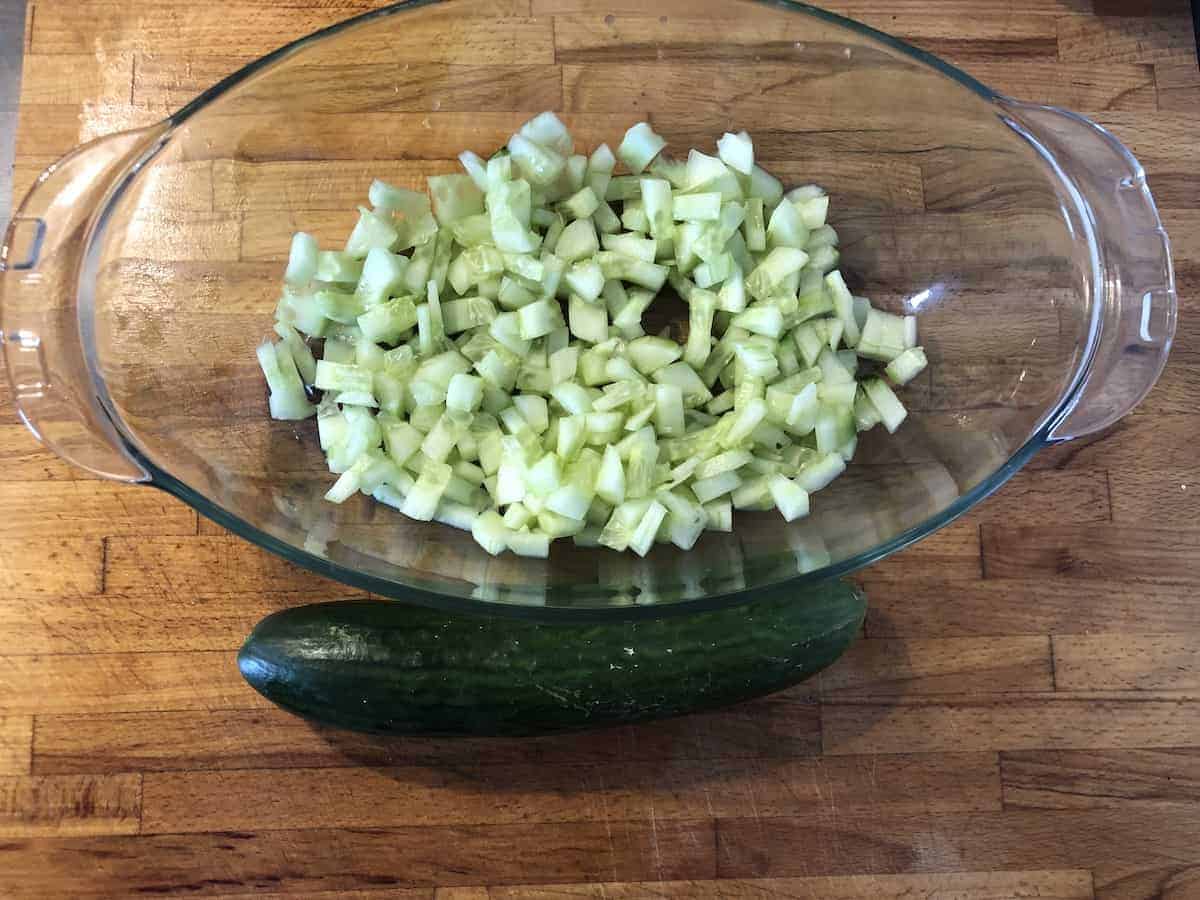 Diced cucumber in a bowl.