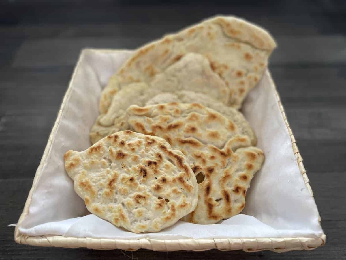 Polish flatbreads in a bread basket.