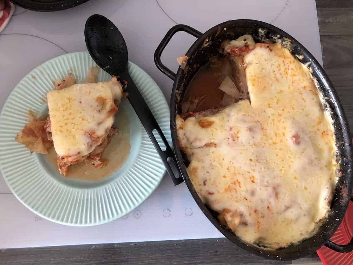 polish lasagna topped with cheese.