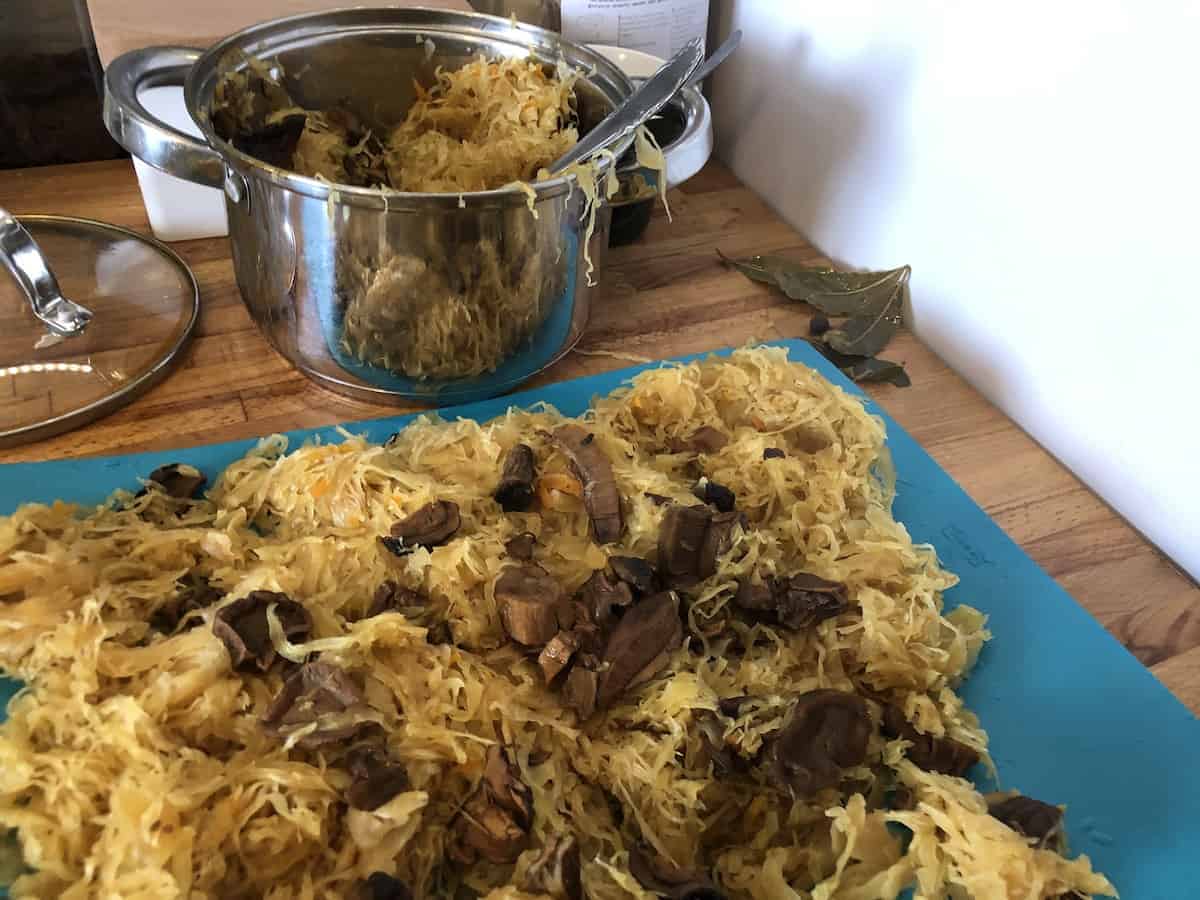 A plate of noodles with mushrooms.