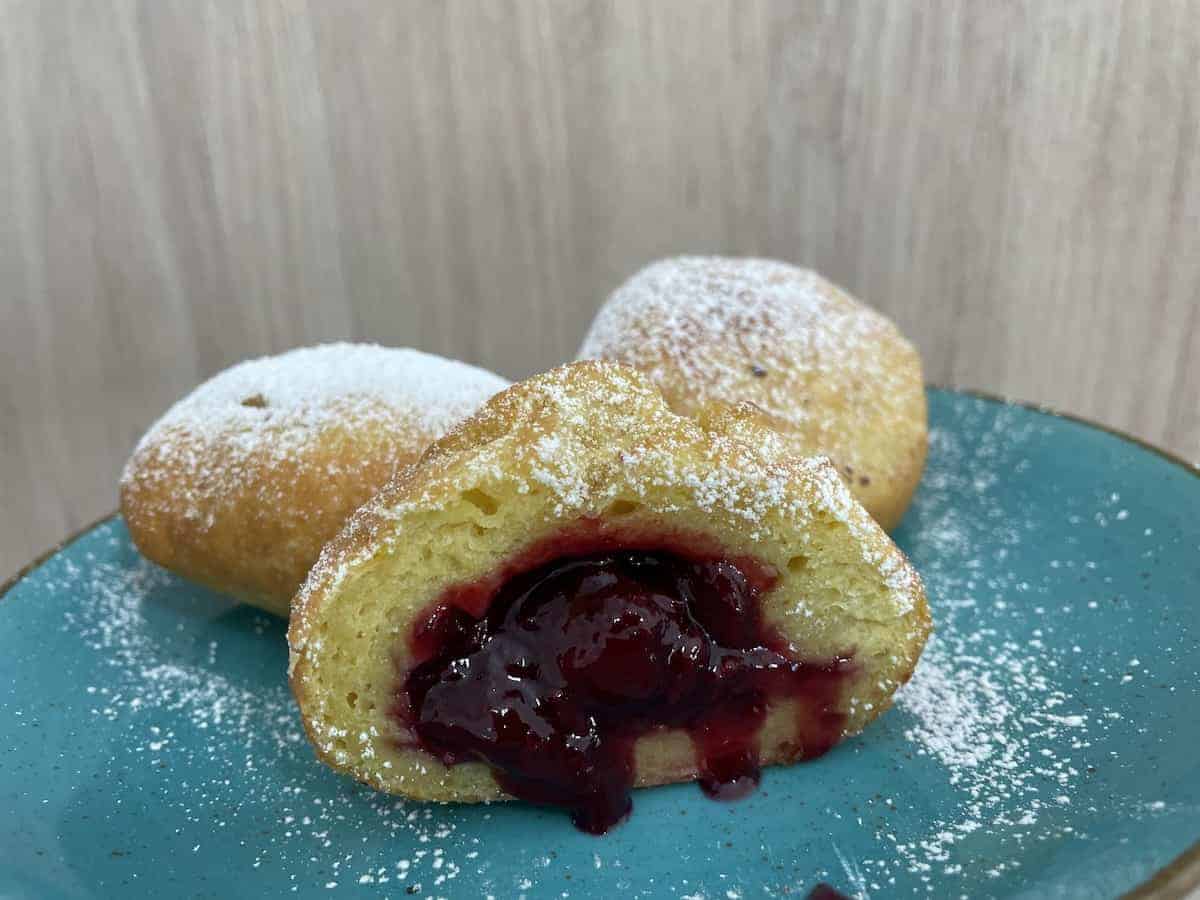 Jam filled Kuyavian potato donuts.