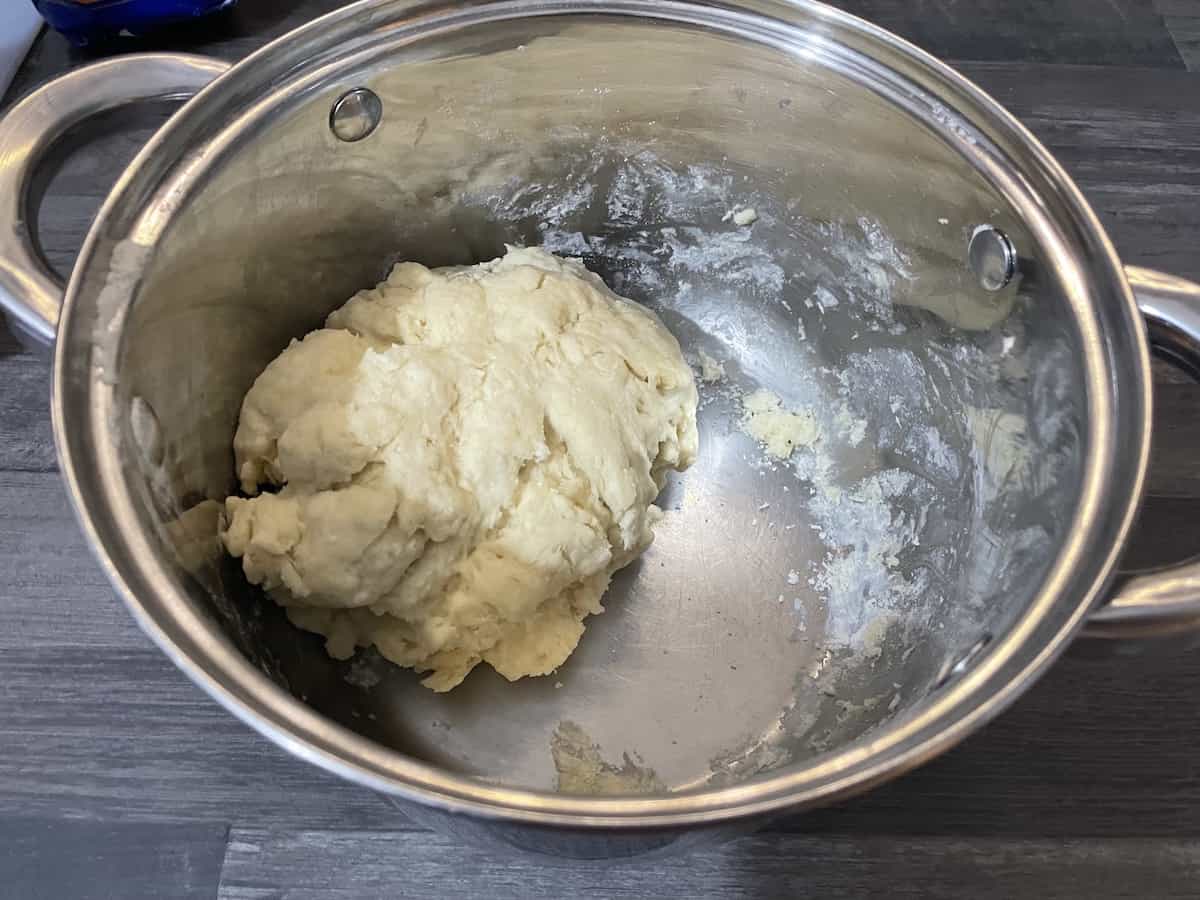 Dough for chlebiczek bread in s steel pot.