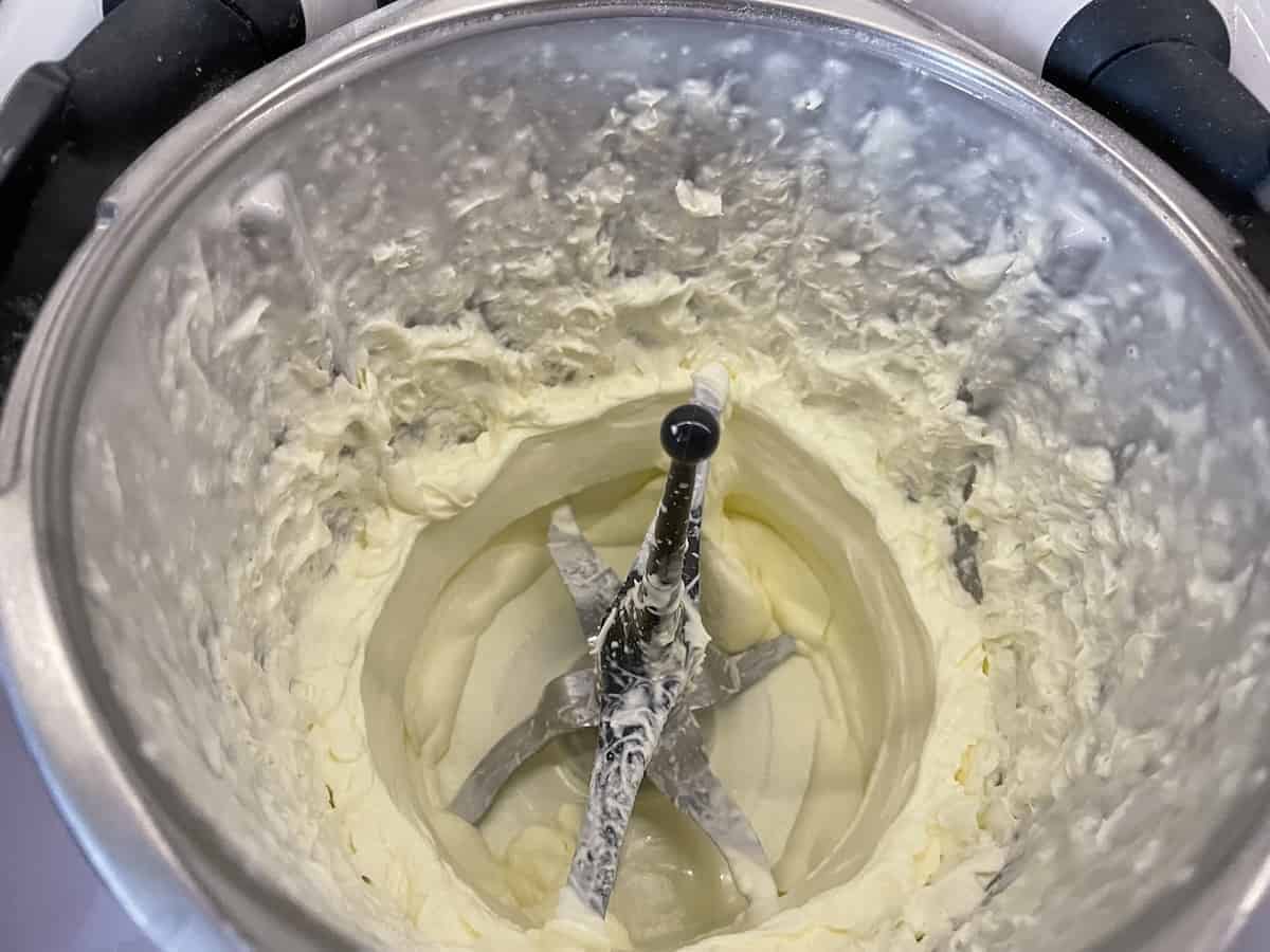 Cream being whipped in a blender.