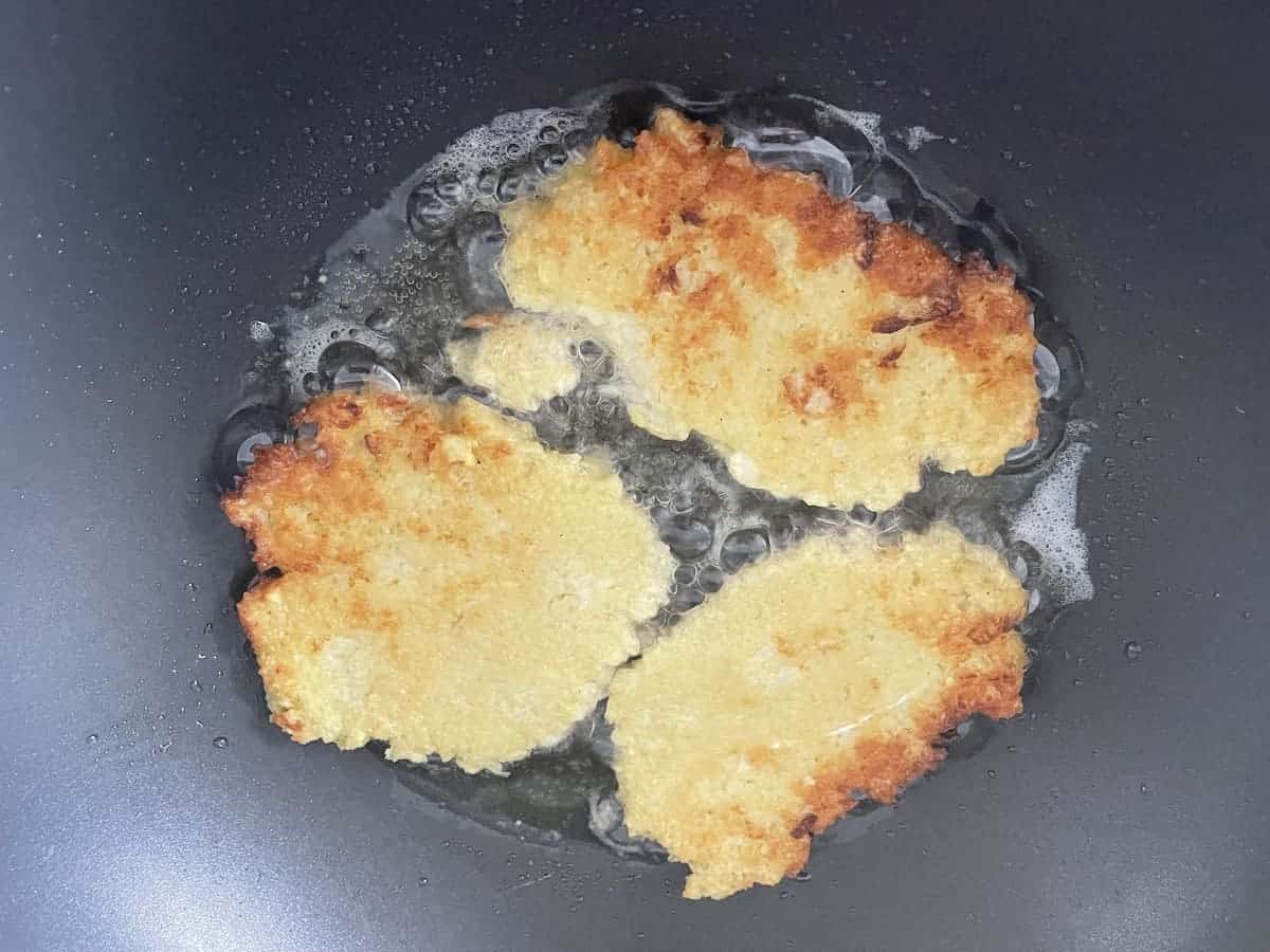 Frying potato pancakes.