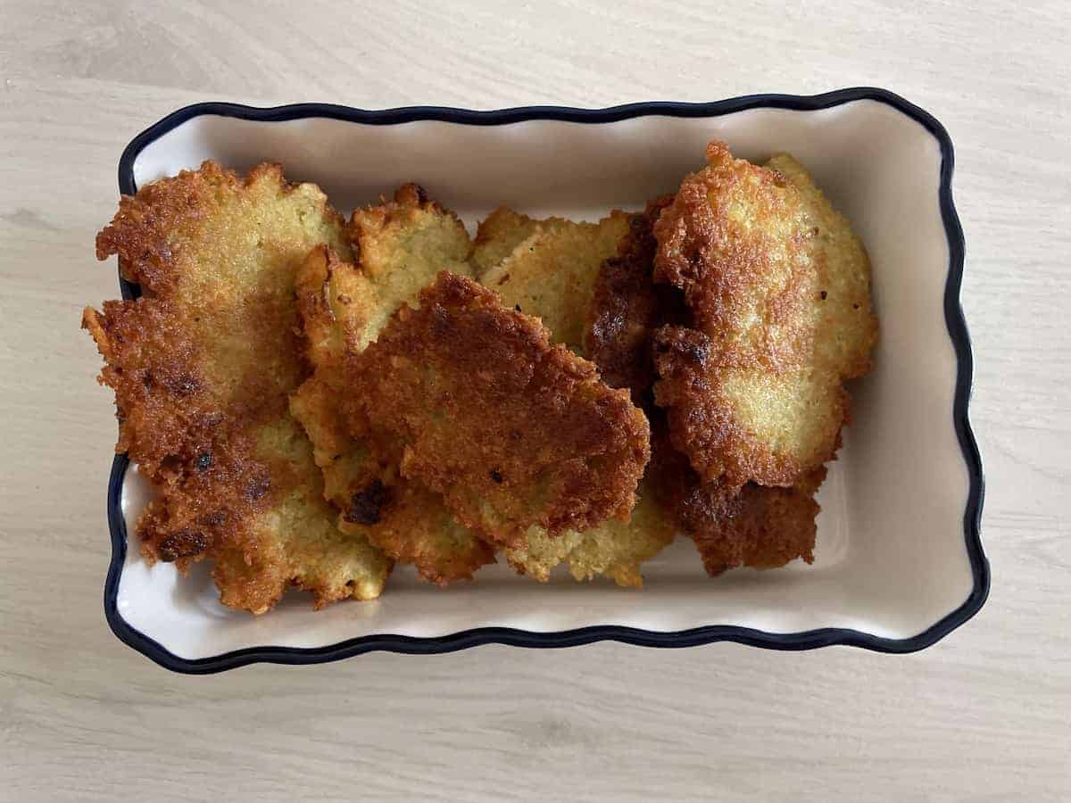 Placki ziemniaczane in a ceramic dish.