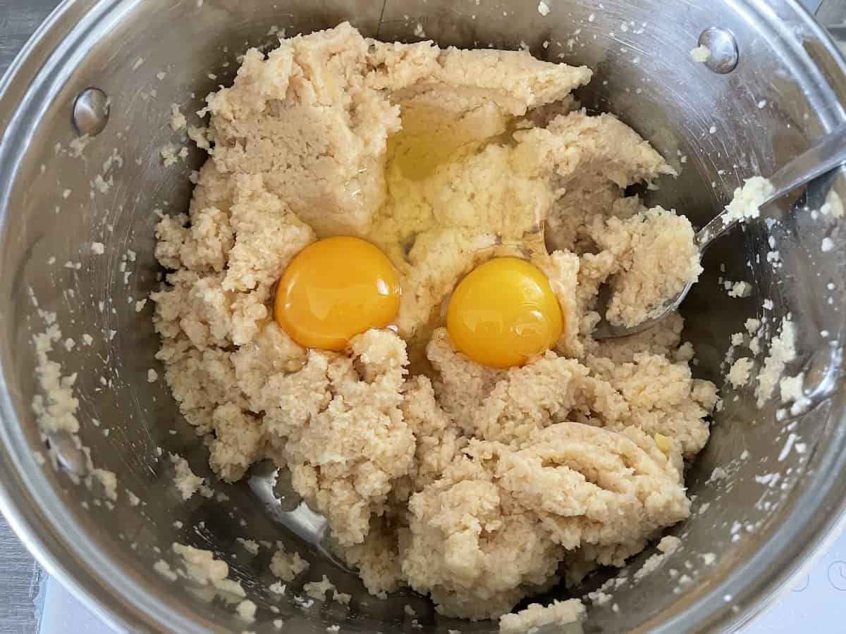 Add eggs to the potato dough.