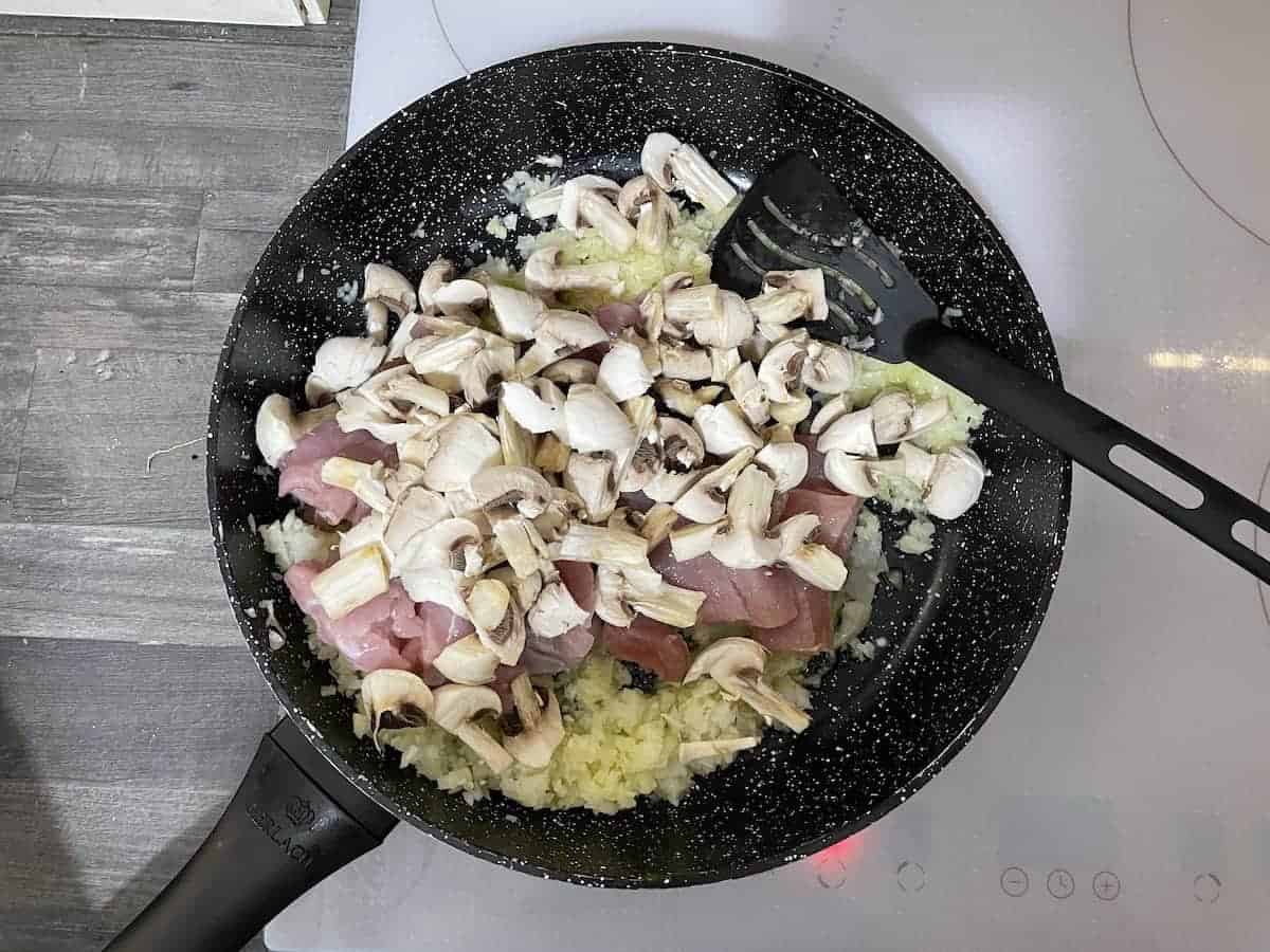 Add the chicken and mushrooms 