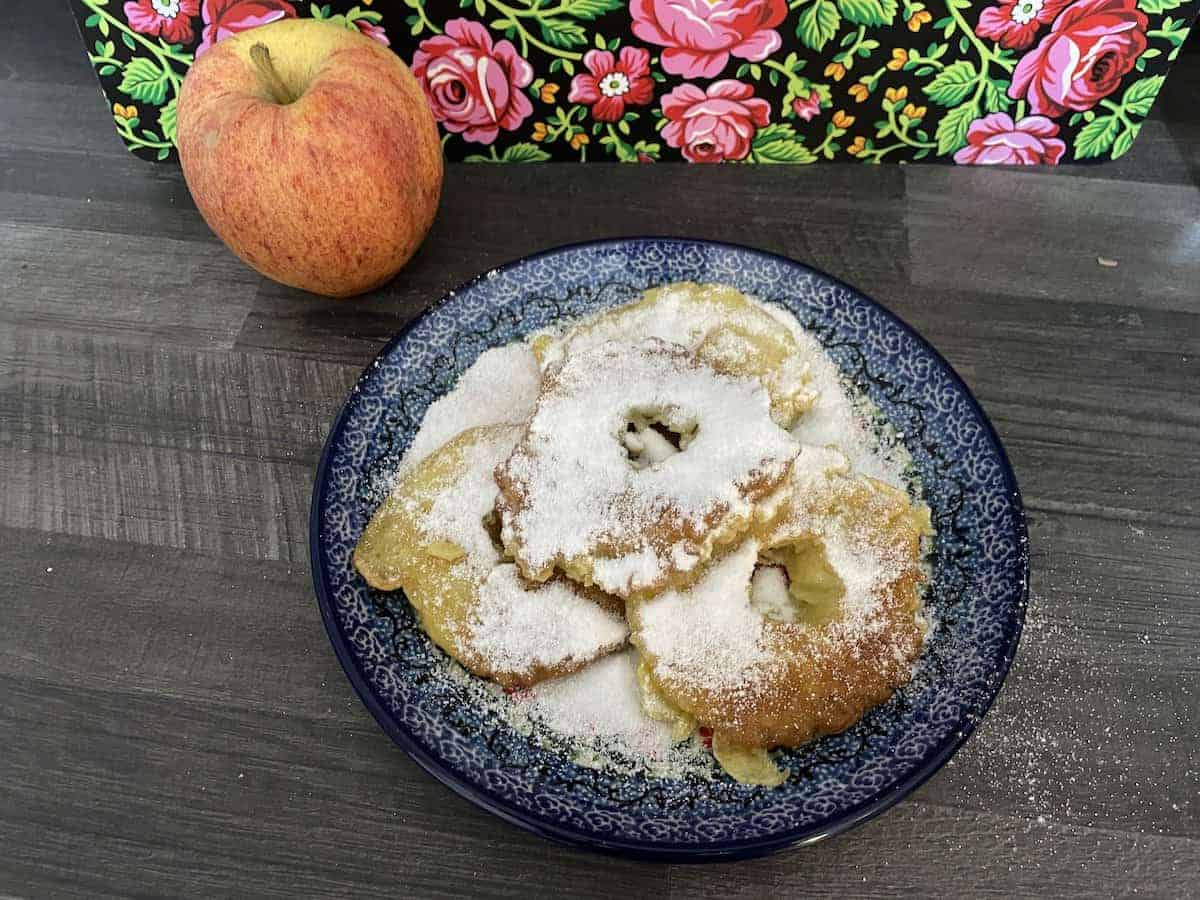 Serve the Polish apple pancakes with powdered sugar