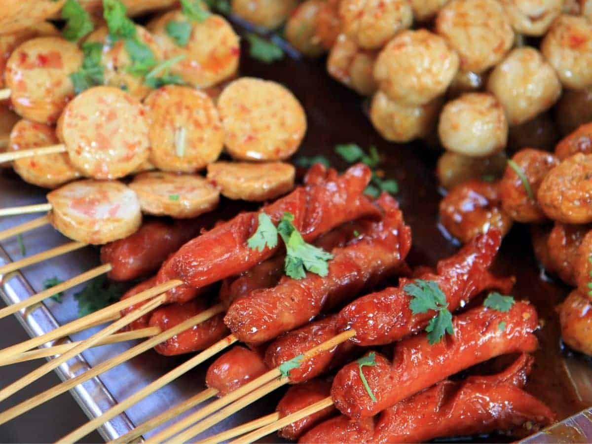 Bangkok street food. Image of a variety of skewers.