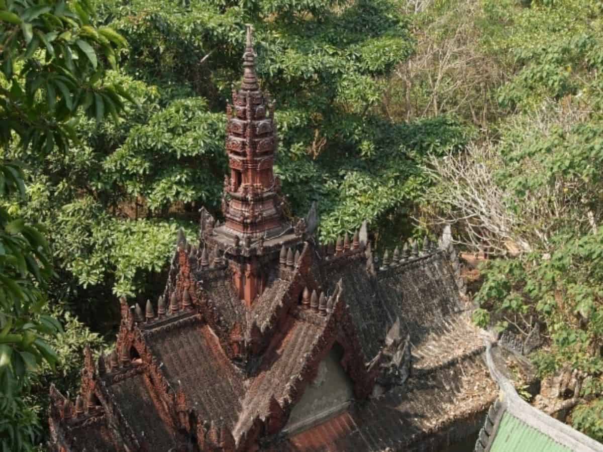 Kulen Mountain Day Trip Image of Kulen Mountain in Cambodia, towering above the green trees